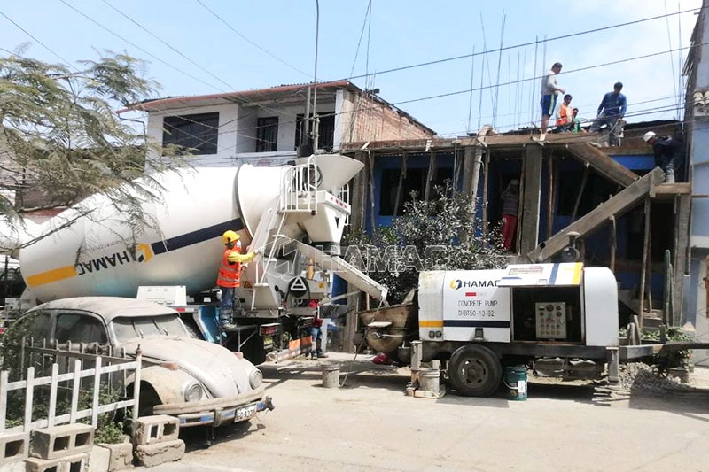 DHBT50 diesel concrete pump for sale encounter HAMAC transit mixer truck by chance.