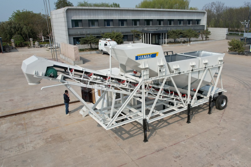 Planta de concreto dry mix cargando camiones hormigonera
